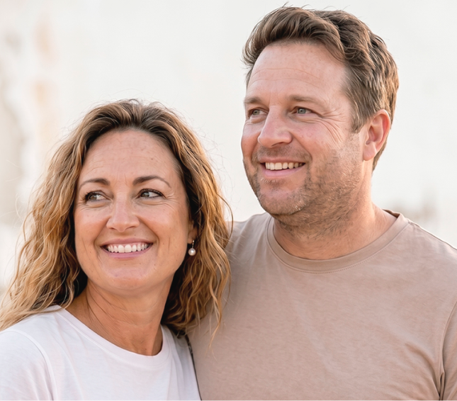 Couple smiling in a Nu Image weight loss and maintenance hero